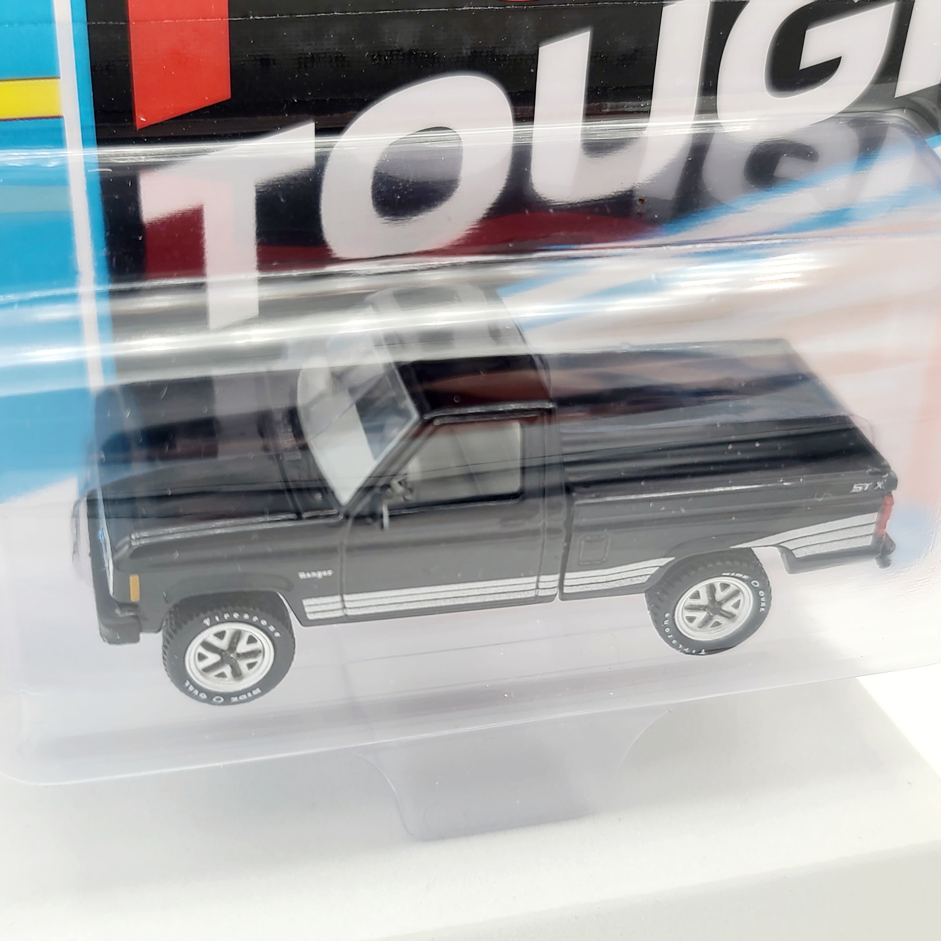 Johnny Lightning '87 Ford Ranger SXT Pickup - 1:64, Black (2025 Classic Gold Release 2 B)
